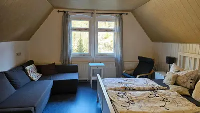 Ein Sitzbereich in der Unterkunft Appartmenthaus Wartburg
