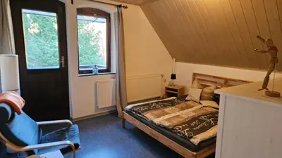 Ein Bett oder Betten in einem Zimmer der Unterkunft Appartmenthaus Wartburg