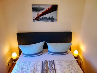 Ein Bett oder Betten in einem Zimmer der Unterkunft Café am Hirschgrund
