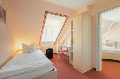 Ein Bett oder Betten in einem Zimmer der Unterkunft Gut Haferkorn GmbH