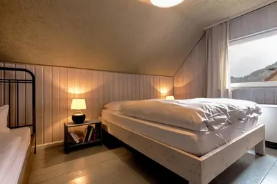 Ein Bett oder Betten in einem Zimmer der Unterkunft Ferienhaus StrandHaus