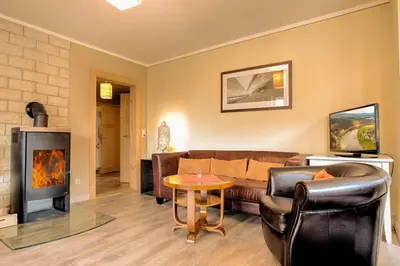 Ein Sitzbereich in der Unterkunft Apartment Schrammsteinblick 1