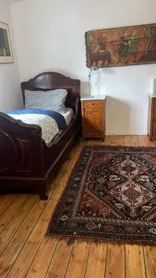 Ein Bett oder Betten in einem Zimmer der Unterkunft Rim Ferienwohnung in Lauchhammer mit Balkon