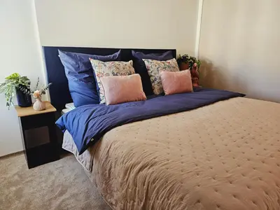 Ein Bett oder Betten in einem Zimmer der Unterkunft Elegantes Loft mit 2 Etagen im Königsviertel