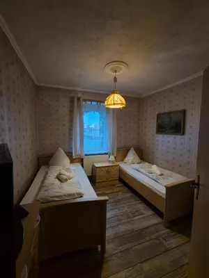 Ein Bett oder Betten in einem Zimmer der Unterkunft Historisches Erbgericht Neukirch Lausitz