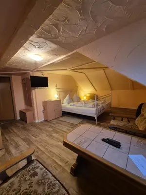 Ein Bett oder Betten in einem Zimmer der Unterkunft Historisches Erbgericht Neukirch Lausitz