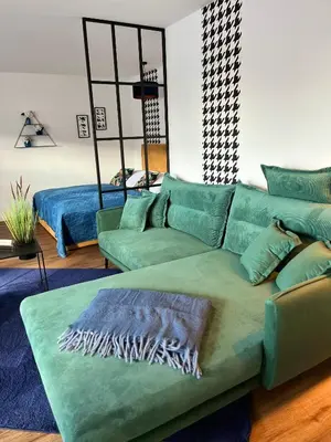Ein Sitzbereich in der Unterkunft ANER 5 elegantes Neustadt Apartment Abby
