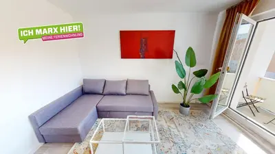 Ein Sitzbereich in der Unterkunft 3-Raum-Ferienwohnung mit Balkon, Straßenbahnlinie 5 fußläufig erreichbar, WLAN