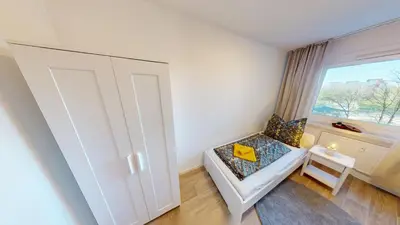 Ein Bett oder Betten in einem Zimmer der Unterkunft Wohlfühlambiente trifft Ostalgiecharme, WLAN