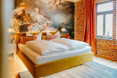 Ein Bett oder Betten in einem Zimmer der Unterkunft Historischer Gasthof Zum Anker Wachau