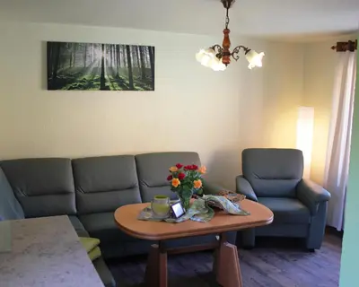 Ein Sitzbereich in der Unterkunft Ferienhof Leuner