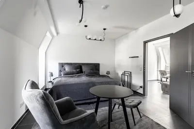 Ein Bett oder Betten in einem Zimmer der Unterkunft Elbflorenz Familien Suites