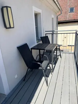 Ein Balkon oder eine Terrasse in der Unterkunft Reihenhaus Elbquartier mit 3 SZ