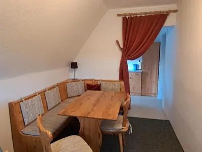 Ein Sitzbereich in der Unterkunft Pension Haus Pentacon