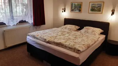 Ein Bett oder Betten in einem Zimmer der Unterkunft Ferienwohnung Winkler
