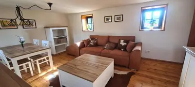 Ein Sitzbereich in der Unterkunft Gästehaus zum Rosengarten
