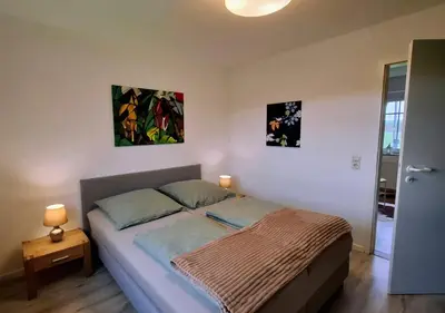 Ein Bett oder Betten in einem Zimmer der Unterkunft 30 qm Fewo ländliche Lage Nossen