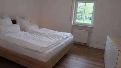Ein Bett oder Betten in einem Zimmer der Unterkunft Bergidylle- Saniert und Hochwertig mit Massivholzmöbeln, Sonnenterrasse in der Natur, fußgängig ins Zentrum