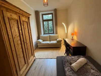 Ein Sitzbereich in der Unterkunft Privatzimmer in 4 Zimmer EG Wohnung in Altchemnitz