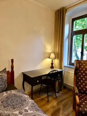 Ein Bett oder Betten in einem Zimmer der Unterkunft Privatzimmer in 4 Zimmer EG Wohnung in Altchemnitz