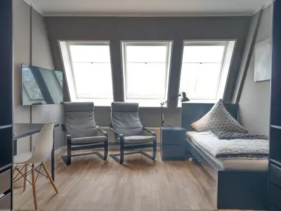 Ein Sitzbereich in der Unterkunft Apartment I Lausitzring I BASF
