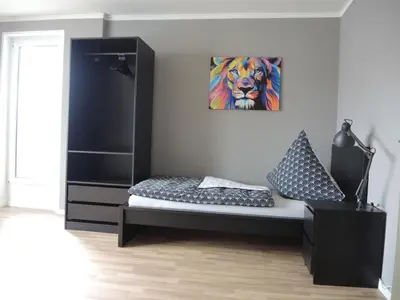 Ein Bett oder Betten in einem Zimmer der Unterkunft Apartment I Lausitzring I BASF