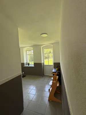 Ein Sitzbereich in der Unterkunft Ferienwohnung Schwalbennest2