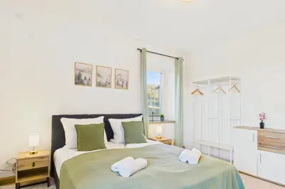Ein Bett oder Betten in einem Zimmer der Unterkunft Holzkunst & Heimatgefühl FeWo für Familie & Freunde