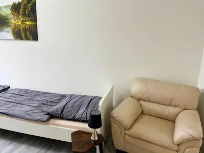 Ein Sitzbereich in der Unterkunft Modern Work & Relax Apartment