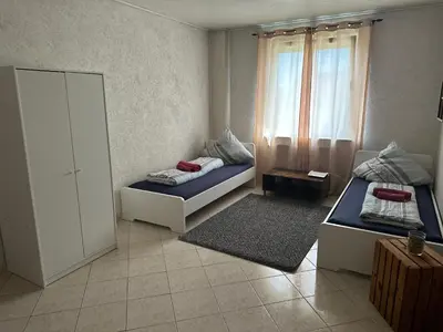 Ein Bett oder Betten in einem Zimmer der Unterkunft Ferienwohnung HY