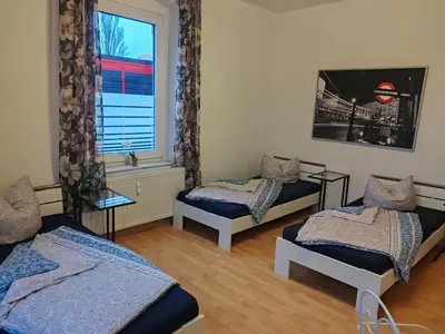 Ein Bett oder Betten in einem Zimmer der Unterkunft Elbe Quartier Meissen Wohnung Nr 9
