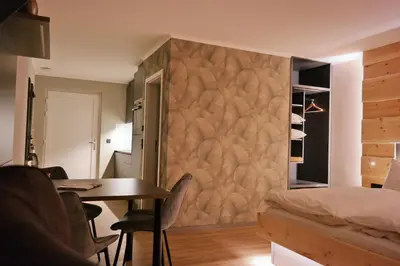 Ein Bett oder Betten in einem Zimmer der Unterkunft Ferienwohnungen FRENZELHOF ZUM KONJECHT