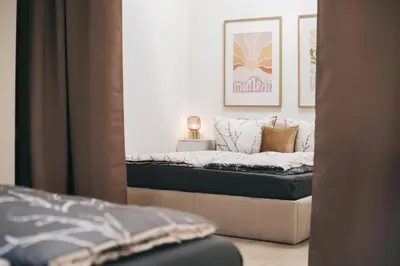 Ein Bett oder Betten in einem Zimmer der Unterkunft TIP! Großzügige Ferienwohnung im Herzen der Dresdner Neustadt