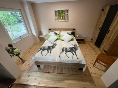 Ein Bett oder Betten in einem Zimmer der Unterkunft Ferienhäuschen Landidyll