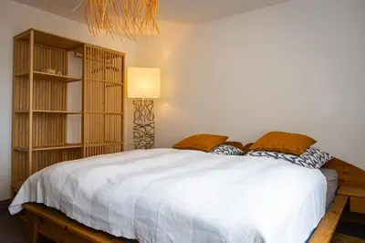 Ein Bett oder Betten in einem Zimmer der Unterkunft Pension Wolf