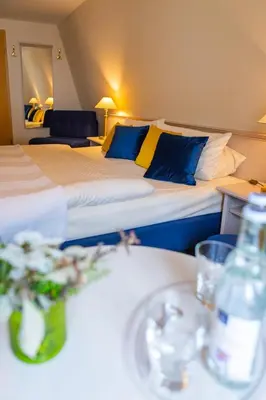 Ein Bett oder Betten in einem Zimmer der Unterkunft Pension Wolf