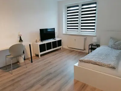 Ein Bett oder Betten in einem Zimmer der Unterkunft Wohnung I Monteur I WiFi