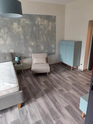 Ein Sitzbereich in der Unterkunft Golden Hop Apartments