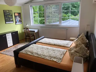 Ein Bett oder Betten in einem Zimmer der Unterkunft Charming Family Retreat in Hoyerswerda, Germany
