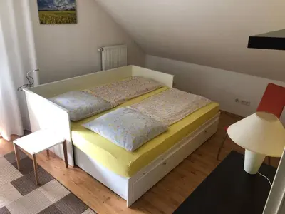Ein Bett oder Betten in einem Zimmer der Unterkunft Charming Family Retreat in Hoyerswerda, Germany