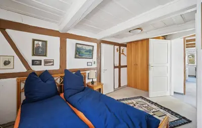 Ein Bett oder Betten in einem Zimmer der Unterkunft Elbferienhaus Altlaubegast