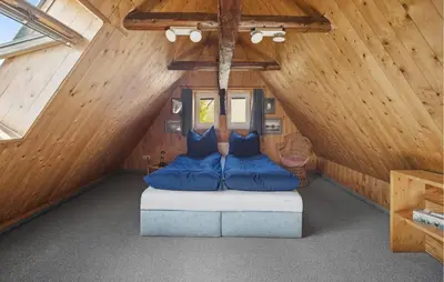 Ein Bett oder Betten in einem Zimmer der Unterkunft Elbferienhaus Altlaubegast