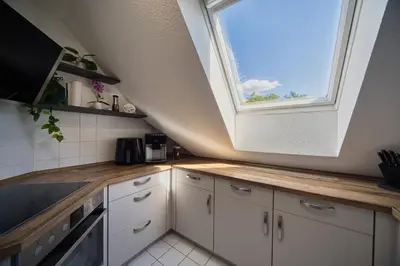 Küche/Küchenzeile in der Unterkunft DresdenStay 3 Schlafzimmer 2 Bäder Balkon Kamin PS4