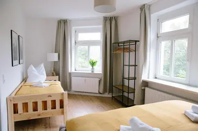 Ein Bett oder Betten in einem Zimmer der Unterkunft stay-a-while Apartment I Etta - Hans I WLAN, kostenloser Parkplatz, Waschmaschine