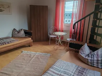 Ein Bett oder Betten in einem Zimmer der Unterkunft Elbe Quartier Meißen Wohnung 13