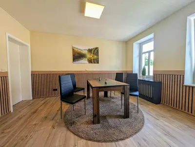 Ein Sitzbereich in der Unterkunft König - Ferienwohnung Waldheim
