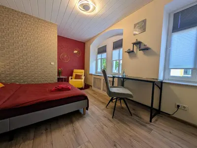 Ein Bett oder Betten in einem Zimmer der Unterkunft König - Ferienwohnung Waldheim