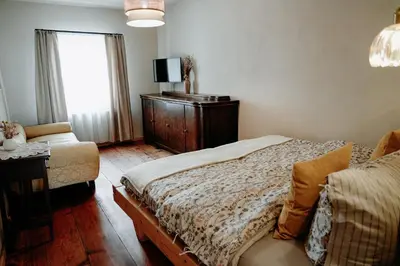 Ein Bett oder Betten in einem Zimmer der Unterkunft Urlaubsfreude Biedermann Haus Blumenglück - Gänseblümchen