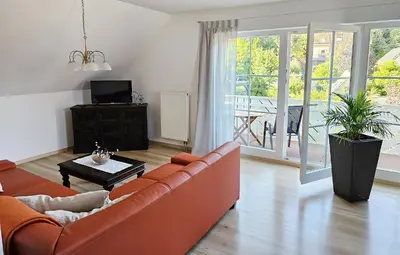 Ein Sitzbereich in der Unterkunft Ferienwohnung Villa Maria