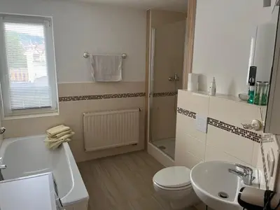 Ein Badezimmer in der Unterkunft Ferienwohnung an der Rosenstraße